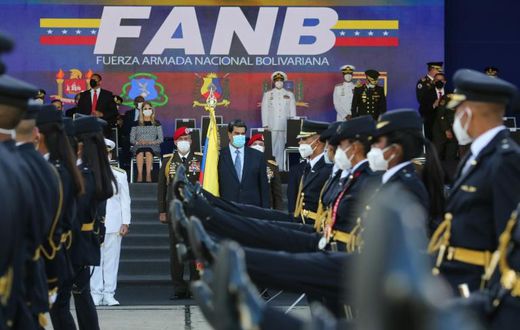 Venezuela President Nicolas Maduro (center) takes part in a ceremony to hand out promotions to military officers