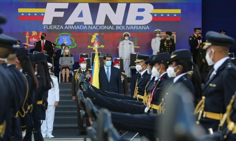 Venezuela President Nicolas Maduro (center) takes part in a ceremony to hand out promotions to military officers