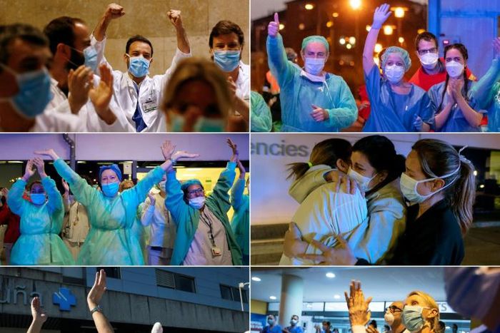 Healthcare workers from around Spain (pictured March 2020) react to the people's support as they are cheered on outside their hospitals in the cities of Barcelona, Burgos, Valencia, Coruna and Palma de Mallorca
