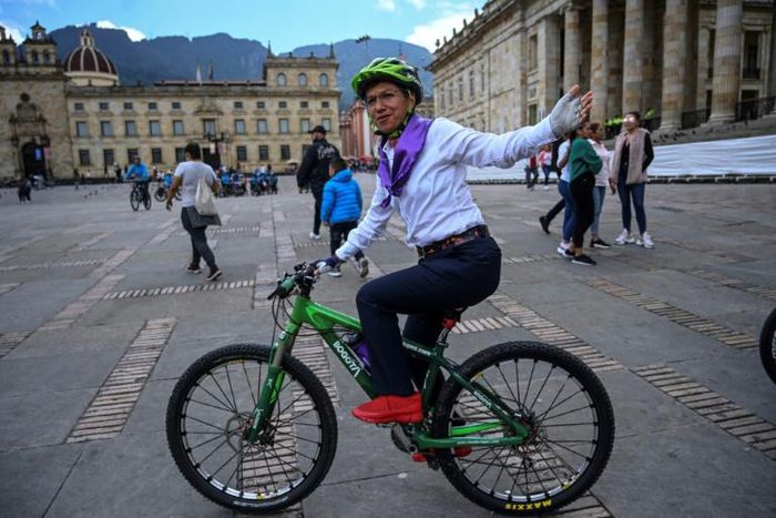 Bogota mayor Claudia Lopez on her bicycle in the city's Plaza Bolívar after taking part in an event for International Women's Day on March 8