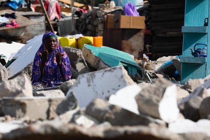 Muslim prays in demolished mosque
