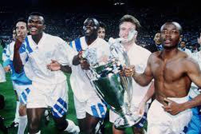 Abedi Pele and his Marseille teammates celebrate after beating AC Milan in the final