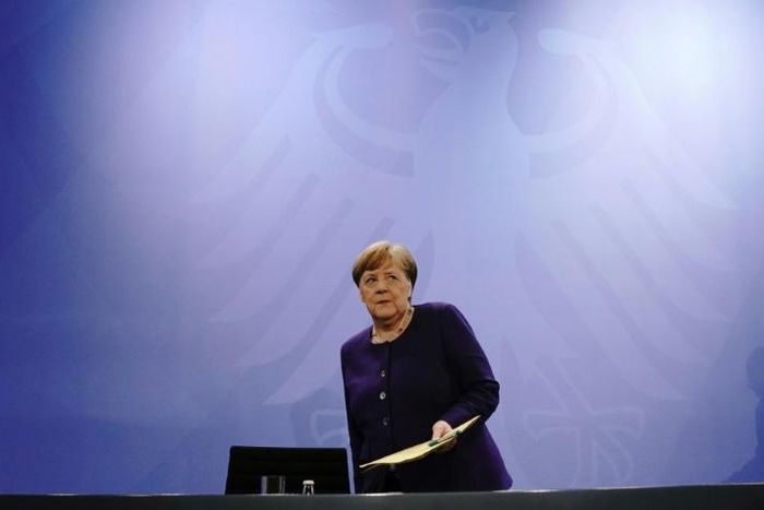 After a meeting with state premiers, German Chancellor Angela Merkel said the relaxing of measures was just a "step", with a more far-reaching plan to be agreed