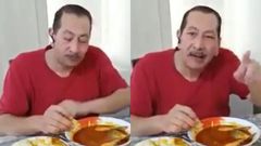 White man eats fufu