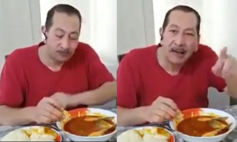 White man eats fufu
