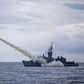 A warship launches a US-made Harpoon missile during the annual drill