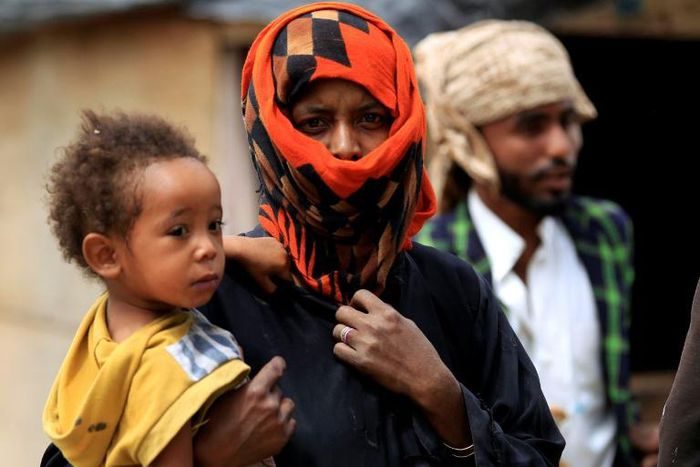 Members of Yemen's minority group known as "Muhamasheen" -- literally the "Marginalised" -- in a slum in the capital Sanaa
