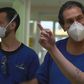 AFPTV filmed doctors like Jaques Sztajnbok (C) in Sao Paulo and other medical workers around the world in action as they battled coronavirus at work and at home