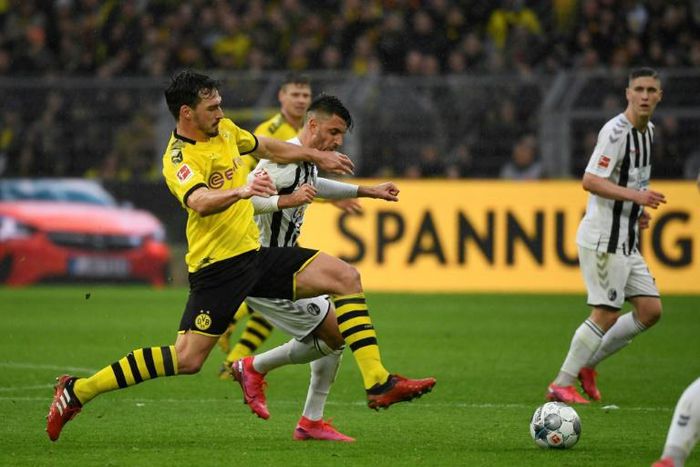 Key Dortmund defender Mats Hummels is "99 precent" ready to face former club Bayern Munich on Tuesday after an Achilles tendon knock.