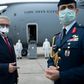 Turkey's ambassador to the United States, Serdar Kilic, waits as a Turkish cargo plane carrying COVID-19 relief supplies is unloaded at Andrews Air Force Base near Washington in April 2020
