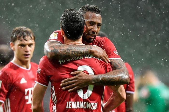 Goalscorer Robert Lewandowski is hugged by Jerome Boateng during Tuesday's 1-0 win at Werder Bremen