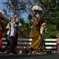 Stranded migrants in Chennai, in southeastern India, prepare to board a special train after the government eased a nationwide coronavirus lockdown