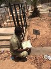 “She was chasing me to school” - Graduate present certificate to late mum at cemetery (photos)
