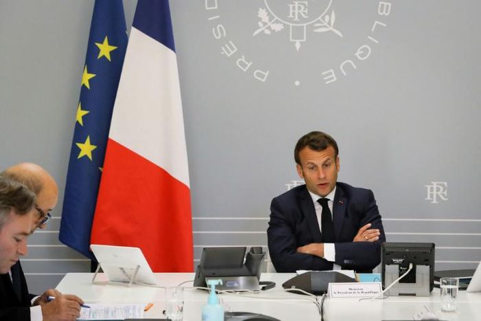 French President Emmanuel Macron taking part in a video meeting with industry representatives, commercial bosses and celebrity chefs