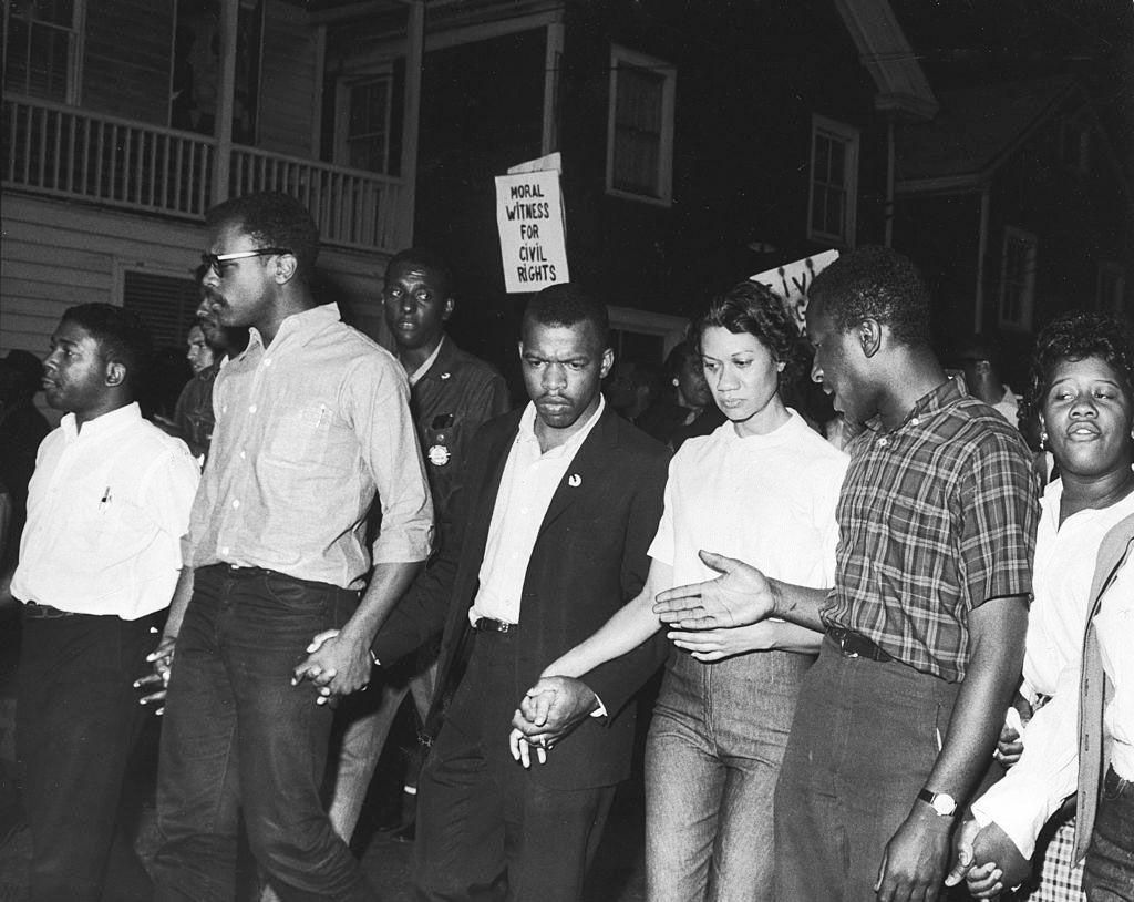 Lewis, center, marching in protest of a scheduled speech by the pro-segregationist Alabama governor, George Wallace, in Cambridge, Maryland, May 1964.