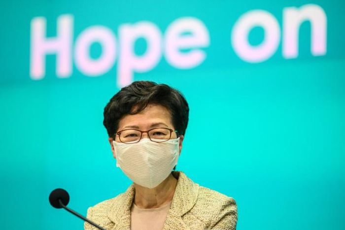 Hong Kong leader Carrie Lam sported a fabric mask Tuesday that she said would be distributed to all city residents