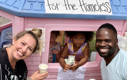 Ashanti Frimpong and her parents Erica & Akwasi Frimpong in front of Ashanti’s lemonade stand June 13, 2020