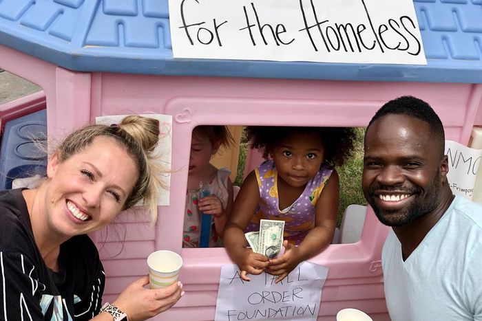 Ashanti Frimpong and her parents Erica & Akwasi Frimpong in front of Ashanti’s lemonade stand June 13, 2020