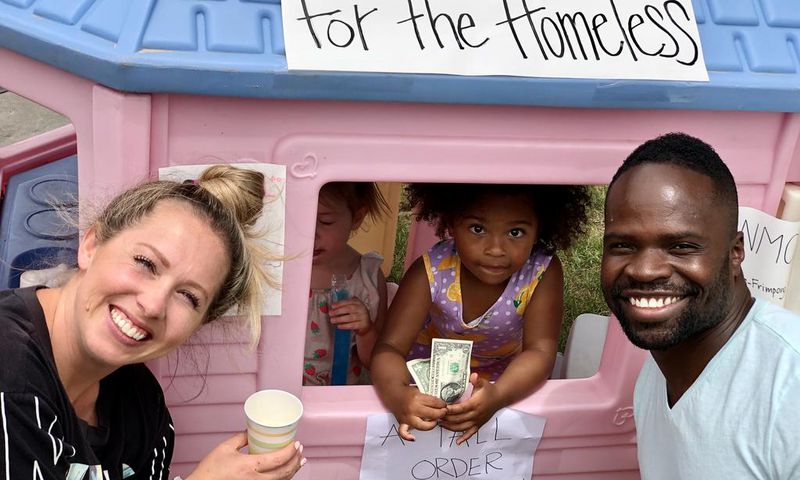 Ashanti Frimpong and her parents Erica & Akwasi Frimpong in front of Ashanti’s lemonade stand June 13, 2020