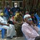 Residents wait to offer a sample for COVID-19 testing in Chennai