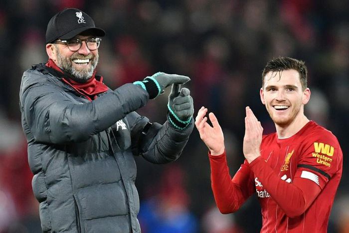 Football 'dad': Andy Robertson (right) says Liverpool manager Jurgen Klopp has been a father figure to the squad