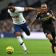 Manchester City's Raheem Sterling (right) has expressed concern over a quick return for the Premier League