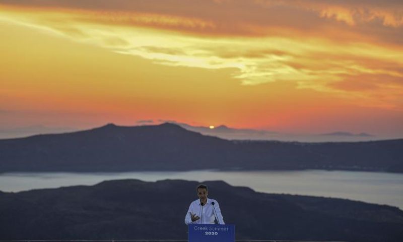 Greek Prime Minister Kyriakos Mitsotakis used the island of Santorini to announce that Greece is 'ready' to welcome tourists