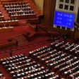 A screen shows the result of the vote on a proposal to draft a security law on Hong Kong during the closing session of the National People's Congress at the Great Hall of the People in Beijing