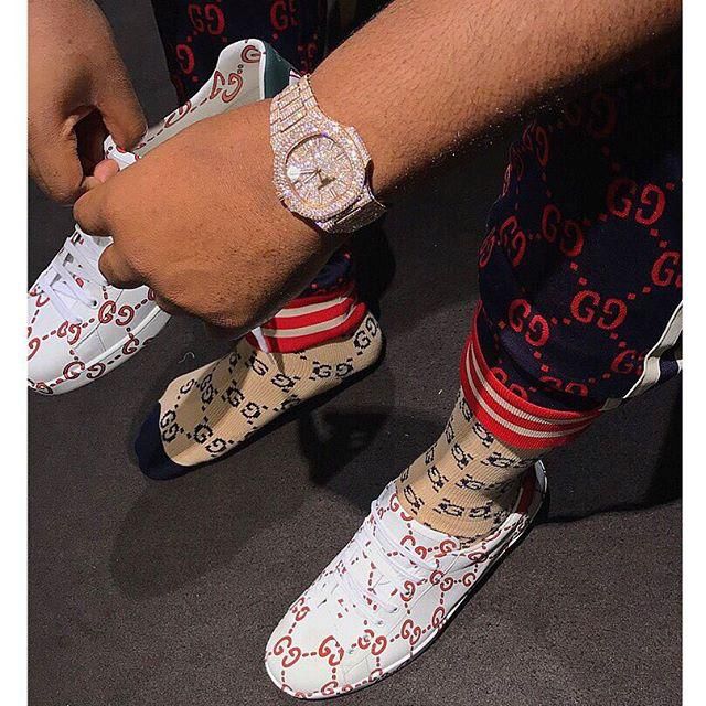 Hushpuppi in his signature Gucci and Patek Phillipe watch