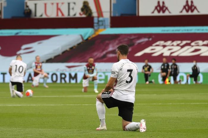 Aston Villa and Sheffield United players kneel in solidarity with the Black Lives Matter cause