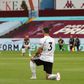 Aston Villa and Sheffield United players kneel in solidarity with the Black Lives Matter cause