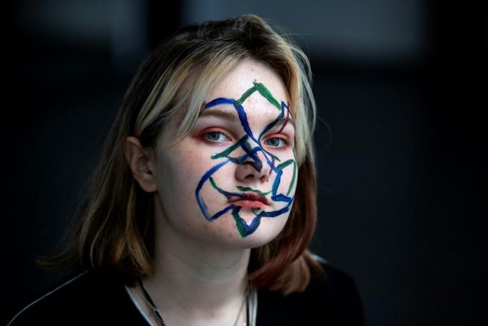 Activists in Moscow protesting the use of facial recognition technology paint geometrical shapes and lines on their faces as this is said to confuse the system
