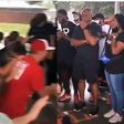 Emotional video shows a crowd of White people kneeling down before Blacks to seek forgiveness for racism