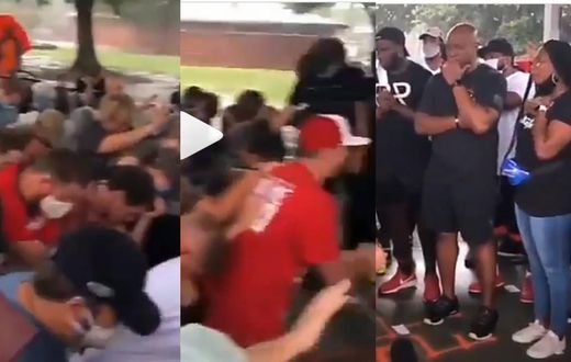 Emotional video shows a crowd of White people kneeling down before Blacks to seek forgiveness for racism