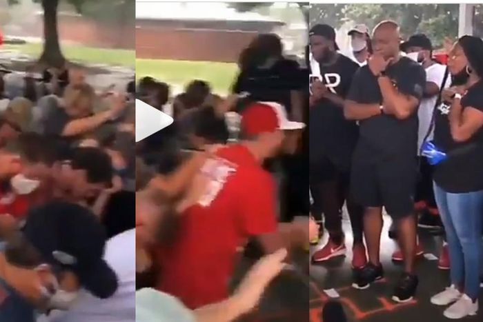 Emotional video shows a crowd of White people kneeling down before Blacks to seek forgiveness for racism