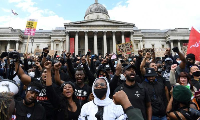 A march by several hundred Black Lives Matter activists through the British capital went ahead at lunchtime Saturday, ending in Trafalgar Square near where counter protesters had gathered and amid a heavy police presence