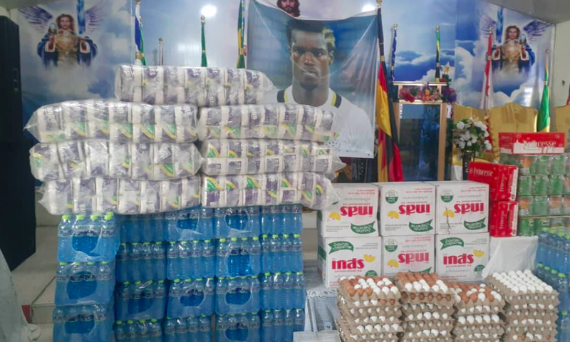John Boye donates to widows and widowers in his community