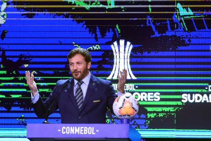 CONMEBOL president Alejandro Dominguez, pictured in December, says health precautions will be taken before restarting the continent's football program