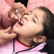 Health workers administer polio drops to a child in the Indian city of Amritsar in January 2020