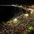 Crowds massing on Nice's  Promenade des Anglais esplanade for electro house music producer The Avener's set