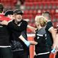 Union Berlin's Swiss head coach Urs Fischer (2ndL) celebrates with his team after victory over Paderborn on Tuesday confirmed they will stay up next season.