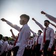 Students and youths attend a mass gathering denouncing 'defectors from the north', at the Pyongyang Youth Park Open-Air Theatre, in Pyongyang, on June 6, 2020