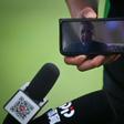 Beijing Guoan’s head coach Bruno Genesio speaks from France
