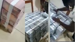 Video shows bundles of gh¢100 and gh¢200 cash being offloaded into unknown house