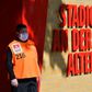 On guard: A volunteer wearing a face mask stands next to the entrance to the Alten Foersterei stadium prior to the Bundesliga match between Union Berlin and Bayern Munich
