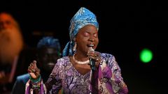 Beninese singer-songwriter Angelique Kidjo, shown here at the 2020 Grammys, says coronavirus exposes how "greed has fragilized our system"
