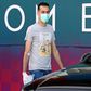 Barcelona's Sergio Busquets wearing a face mask and gloves on arrival at the club's training ground last week