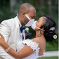A touching photo shows how two newlyweds shared their first kiss through face masks.