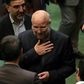 Iranian Mohammad-Bagher Ghalibaf (C) stands among members of parliament after being elected speaker