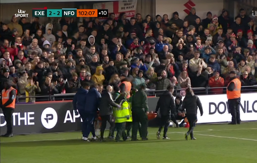 Exeter vs Forest: Ambulance crew rushes to aid Awoniyi after bloody on-pitch collision. Photo credit: ITV